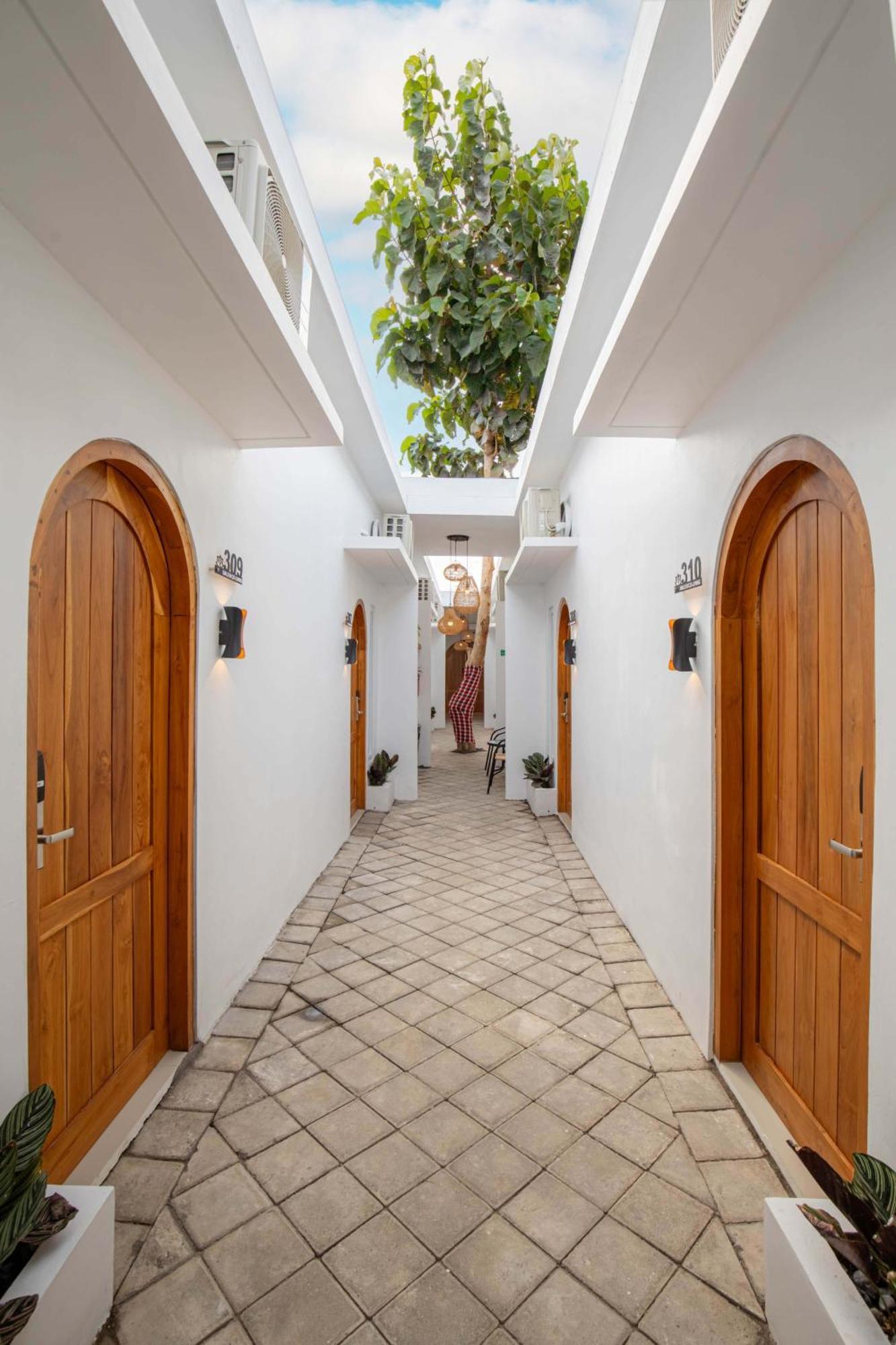 Апарт отель Baliem Coliving Джимбаран Экстерьер фото