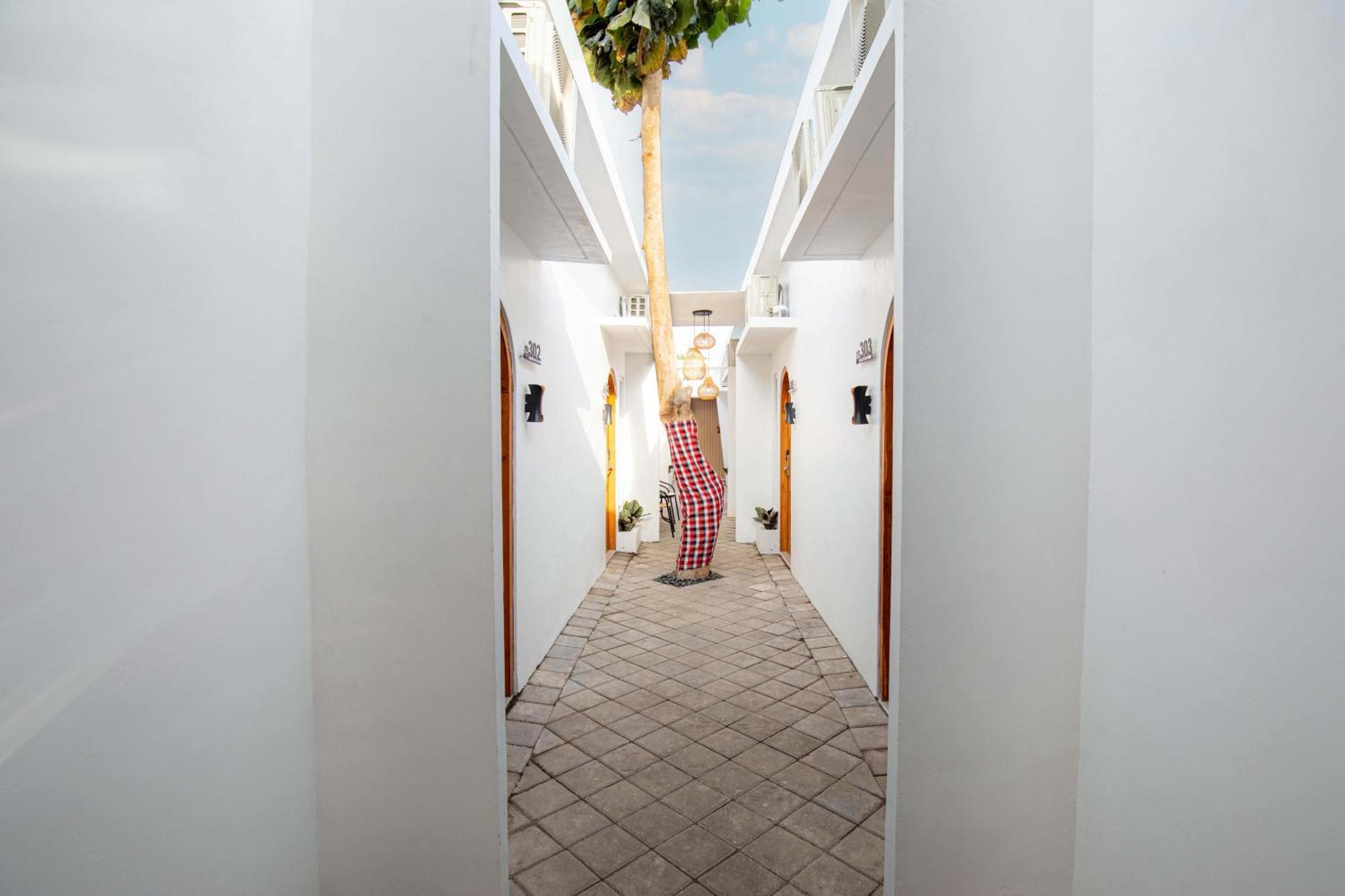 Апарт отель Baliem Coliving Джимбаран Экстерьер фото